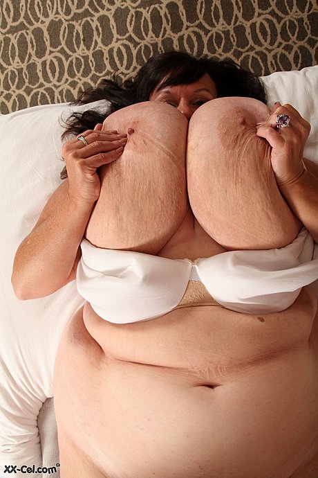 Short older BBW Suzie Q unleashing her monstrous natural melons & posing nude - Image 13 of 20  in Pussy category  