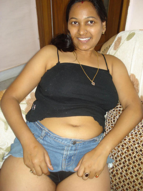 Indian plumper exposes upskirt undergarment after freeing her boobies from a bra - #607066