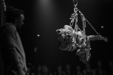 Alternative couple put on a live Shibari show for an enthused audience