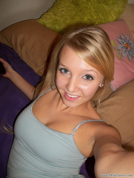 Charming young whore gf girl with blonde hair displays her hairless cunt on her bed - #311634