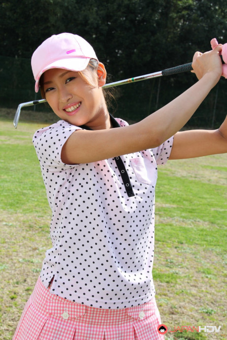 Fresh young Japanese golfer Nao Yuzumiya flashes a no panty up skirt on the course - #761725