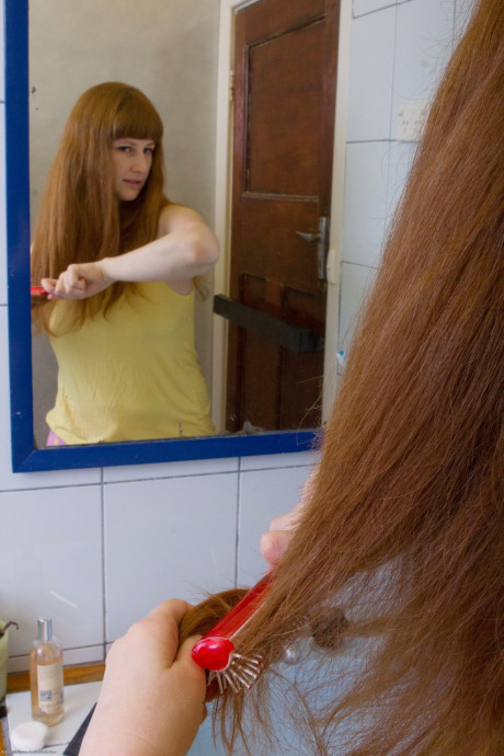 Ginger Chloe B unveils her large titties & butt before rubbing her pierced muff