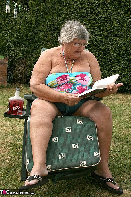 Kinky amateur grandmother Libby inserting a bottle in her meaty vagina in the garden - Image 1 of 20  in Outdoor category   featuring Grandma Libby 