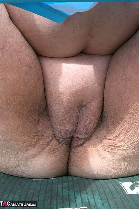 Kinky amateur grandmother Libby inserting a bottle in her meaty vagina in the garden - Image 8 of 20  in Outdoor category   featuring Grandma Libby 