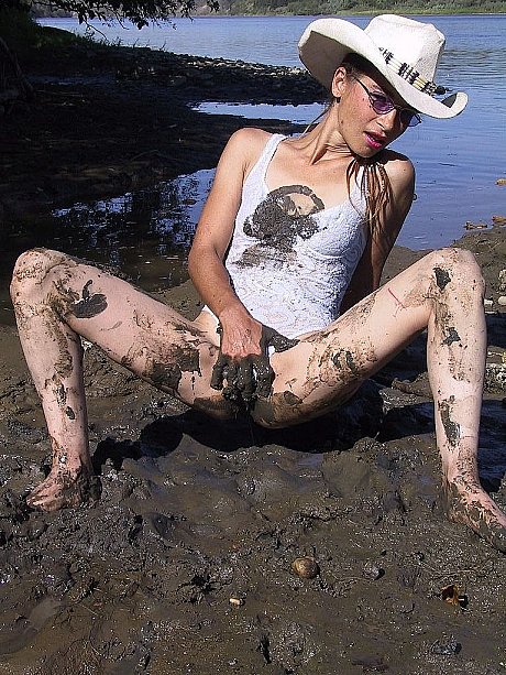 Cowgirl Erika Shelley exposes her tiny breasts while playing in the mud - Image 11 of 21  in Outdoor category   featuring Erika Shelley 