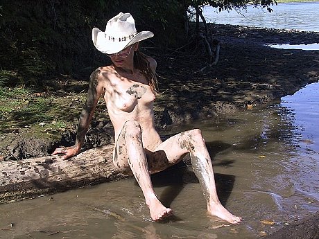 Cowgirl Erika Shelley exposes her tiny breasts while playing in the mud - Image 15 of 21  in Outdoor category   featuring Erika Shelley 