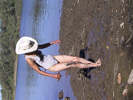 Cowgirl Erika Shelley exposes her tiny breasts while playing in the mud - Image 17 of 21  in Outdoor category   featuring Erika Shelley 