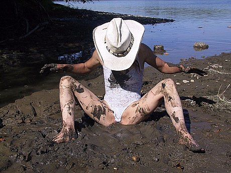 Cowgirl Erika Shelley exposes her tiny breasts while playing in the mud - Gallery #1872