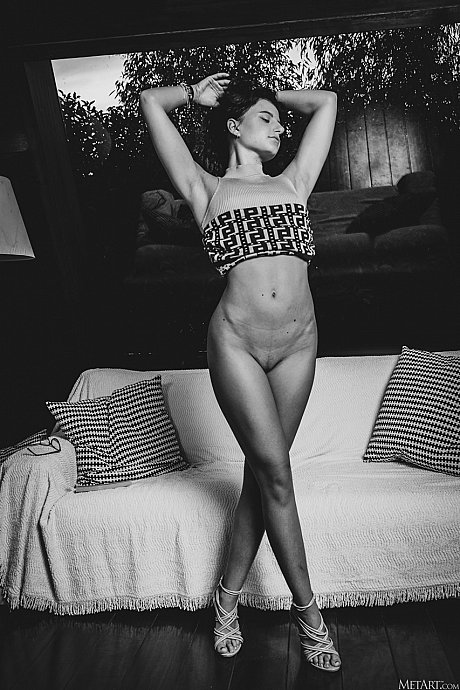 Sexy fresh young lady GF chick strips to her heels before reading a book in ebony and white - Image 17 of 21  in Model category   featuring Zoelie 