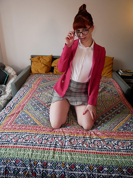 Geeky amateur redhead spreads her legs and shows her ebony panties - Gallery #40586