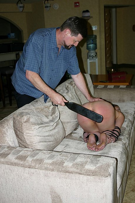 Nude female Ten Amorette has her ass paddled with arms tied to legs - Image 13 of 15  in Dildo category   featuring Ten Amorette 