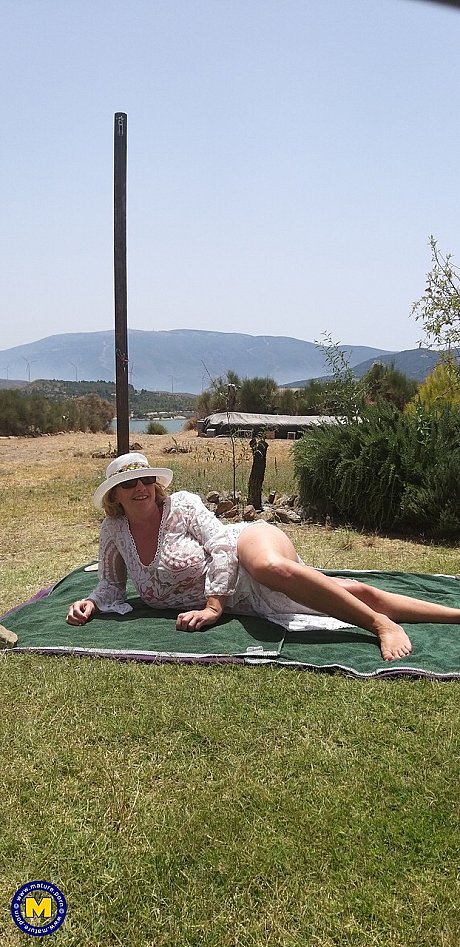 Cougar amateur sports a creampie after sex atop a picnic table - Image 5 of 16  in Outdoor category   featuring Camilla Creampie 