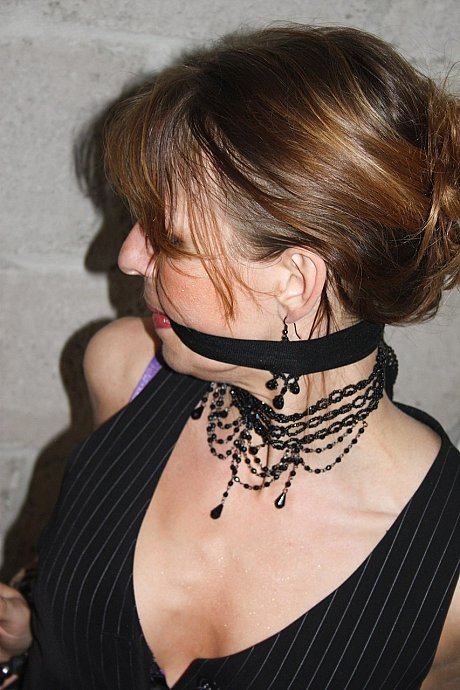 Bound and gagged MILF Eve struggles to free herself on the basement floor - Image 17 of 21  in Legs category   featuring Eve 