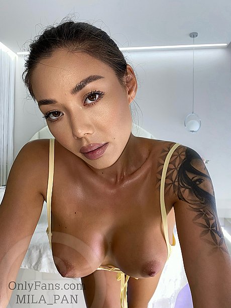 Beautiful Korean babe Mila Pan teases with her firm melons in a solo - Image 1 of 12  in Amateur category  