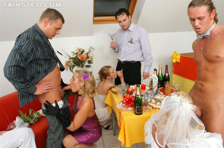 New bride dressed in her wedding dress plays water sport games at reception - #1100080
