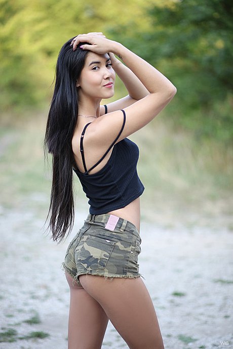 Beautiful babe with naturals chick woman Dee pees before posing nude on a gravel road - Image 1 of 20  in Outdoor category   featuring Lady Dee 