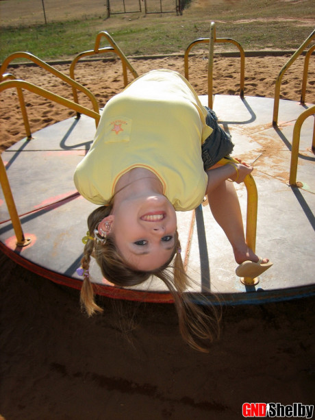 Fine teen exposes her bra and upskirt panties while at a playground - #679786