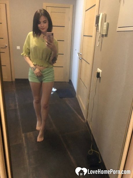 Slender amateur brunette strips and poses naked in front of the mirror - Image 2 of 20  in Amateur category  