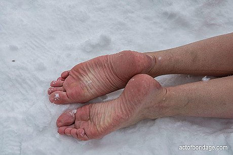 Undressed redhead slave bound outdoors in the winter snow flexing cold bare toes - Image 1 of 16  in Close Up category  