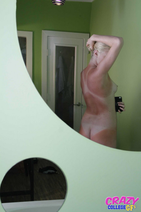 Blondy Ellie Ice takes selfies of her tanned body and bald pussy in the mirror - #174491