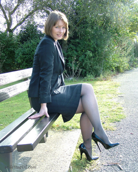 Ravishing charming non undressed chick in black leggings flaunting her heeled feet outdoors - #726085