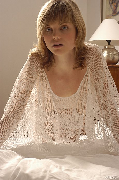 Fine blondie Margo A posing in her see-through white undergarment on the bed - Image 12 of 21  in Pussy category   featuring Margo A 