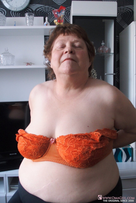 Kinky chubby grandma Hortensia plays with her huge breasts while undressing - #1373912