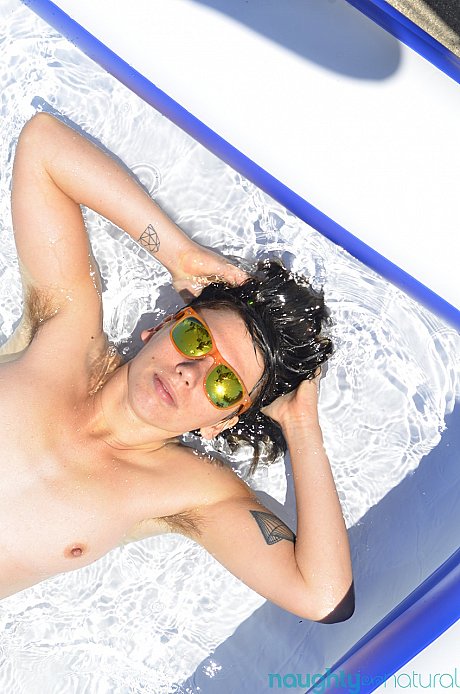 Amateur babe Ozzy Aqua exposes her hairy armpits and pussy in a small pool - Image 15 of 21  in Close Up category   featuring Ozzy Aqua 