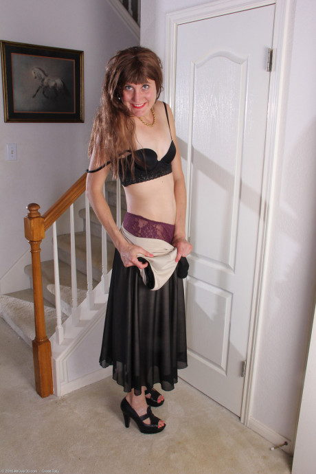 Brunette MILF Katrina Mathews takes off her black outfit and shows bushy vagina - #142790