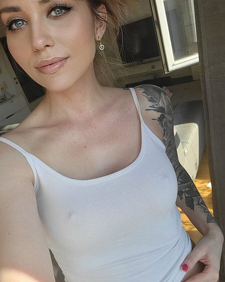 Smoking hot babe flaunts her humongous breasts while showing her fine tattoos - Image 2 of 20  in Model category  