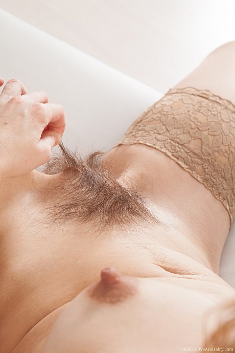 Charming blondie Stella unveils her awesomely hairy pussy in stockings - Image 13 of 20  in Big Clit category   featuring Stella 