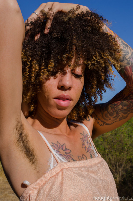 Exotic black Kendi Oh unveils her silky tattooed body in nature - #254729