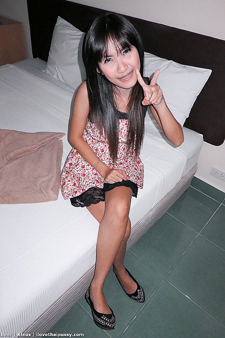 Busty Thai skank GF girl Beer gives up her shaved snatch to a sex tourist in hotel room - Image 1 of 16  in Pussy category  