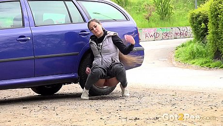 White slut girl girl Lara Fox squats for an urgent piss behind an automobile - Image 13 of 15  in Pussy category   featuring Lara Fox 