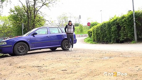 White slut girl girl Lara Fox squats for an urgent piss behind an automobile - Image 14 of 15  in Pussy category   featuring Lara Fox 