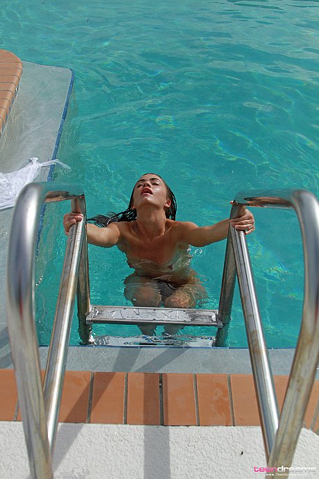 Massive young Layla gets out of the pool nude and fingers her shaved pussy - Image 1 of 21  in Close Up category   featuring Layla 