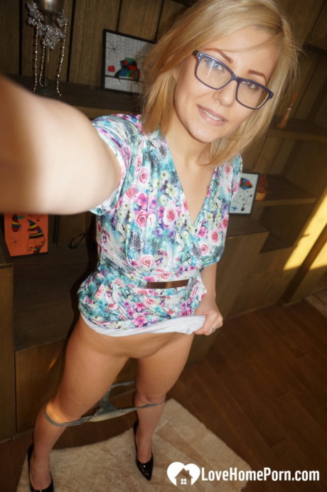 Sleazy yellow-haired amateur shows her pretty delicious breasts & takes selfies around the house