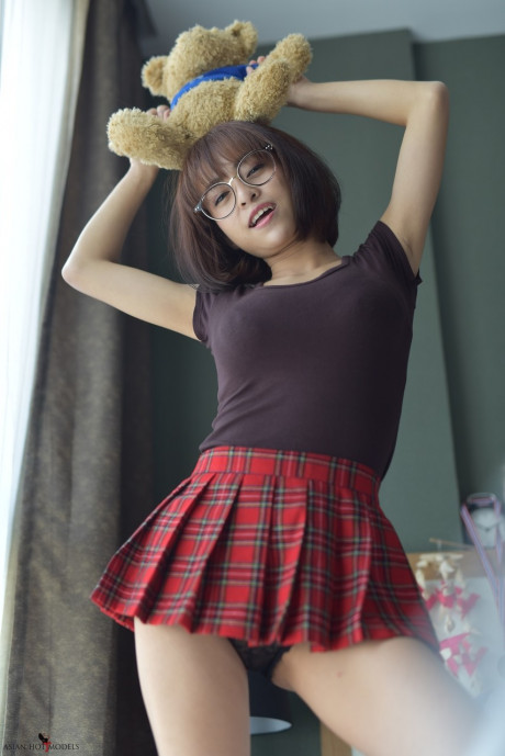 Pretty attractive chinese young flaunts her hot behind wearing a miniskirt and panties - #817380