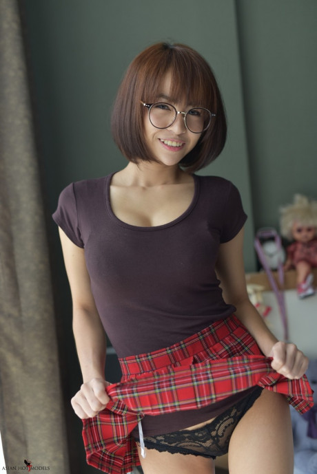 Pretty attractive chinese young flaunts her hot behind wearing a miniskirt and panties - #817384