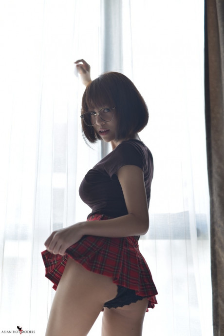 Pretty attractive chinese young flaunts her hot behind wearing a miniskirt and panties - #817388
