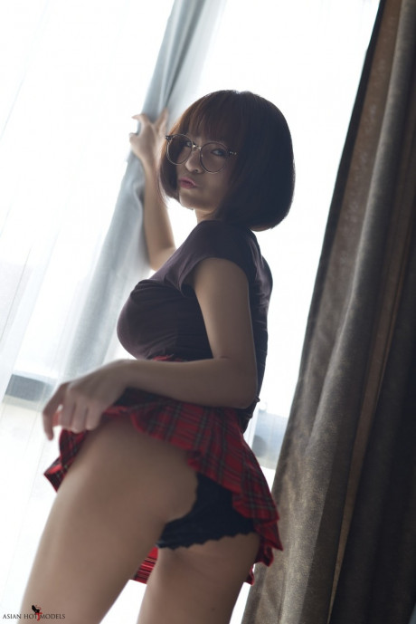 Pretty attractive chinese young flaunts her hot behind wearing a miniskirt and panties - #817389