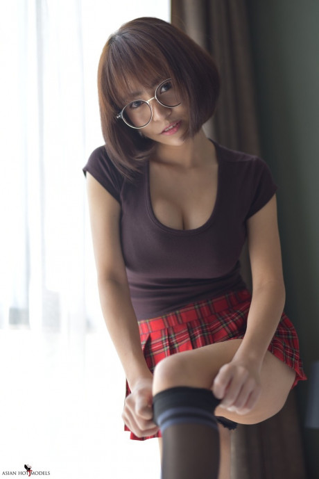Pretty attractive chinese young flaunts her hot behind wearing a miniskirt and panties - #817391