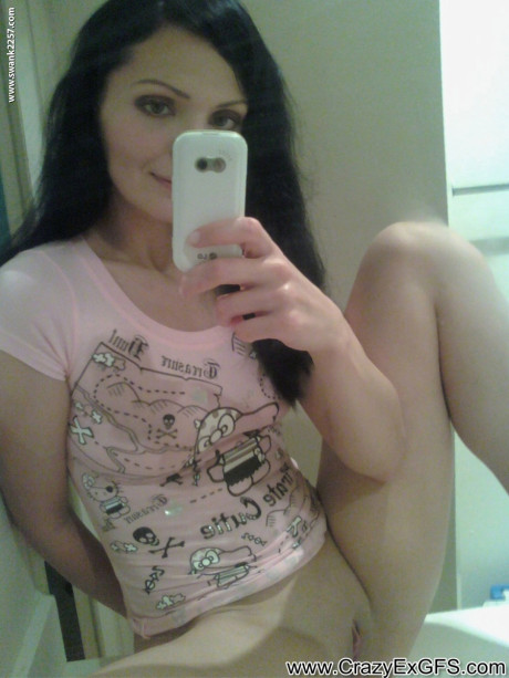 Brunette ex GF takes selfies of her boobies and shaved cunt