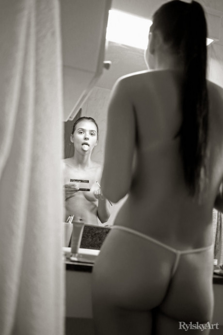 Charming teenie Venice Lei does her makeup in a mirror before modelling in the naked - #887329
