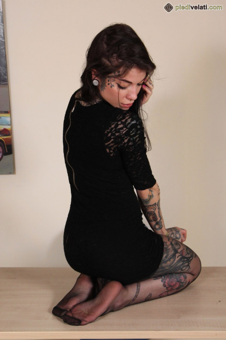 Tattooed skank girlfriend lady Refen removes her red soled heels while wearing stockings - #176501