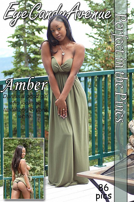 Ebony amateur Amber releases her monstrous breasts from a long dress on a balcony - Image 1 of 16  in Outdoor category   featuring Amber 