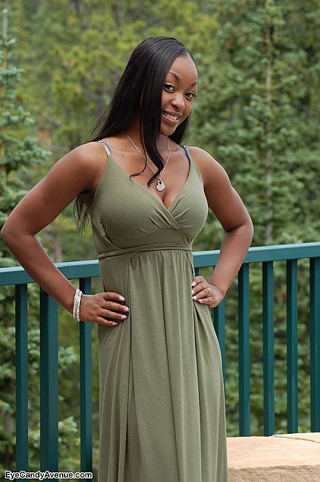 Ebony amateur Amber releases her monstrous breasts from a long dress on a balcony - Image 2 of 16  in Outdoor category   featuring Amber 