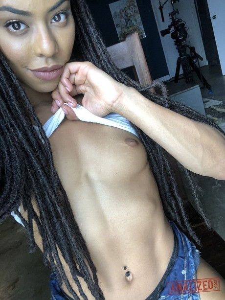 Ebony with dreads Kira Noir unveils her tiny tits and pretty booty in a solo - #49443