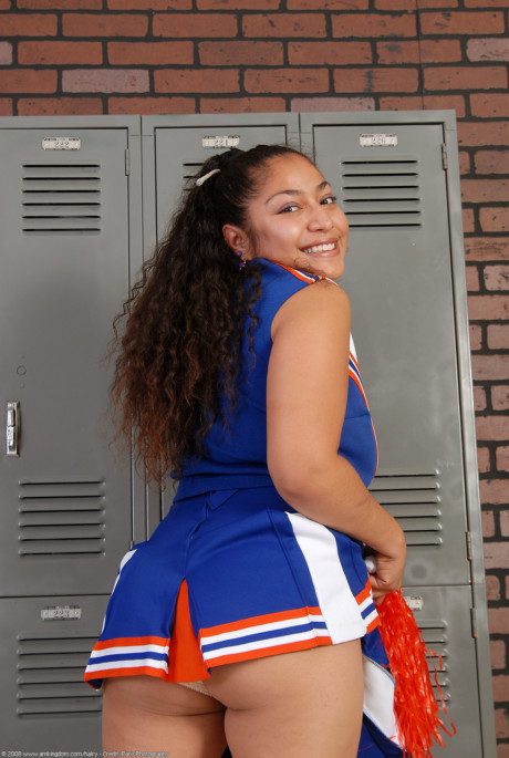 Thin curly haired cheerleader Reena shows her meaty behind and bushy snatch - #1426687