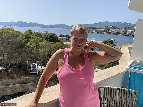 Thick old blondy twerks her large booty on a balcony after exposing herself - Image 5 of 19  in Amateur category   featuring Sweet Susi 